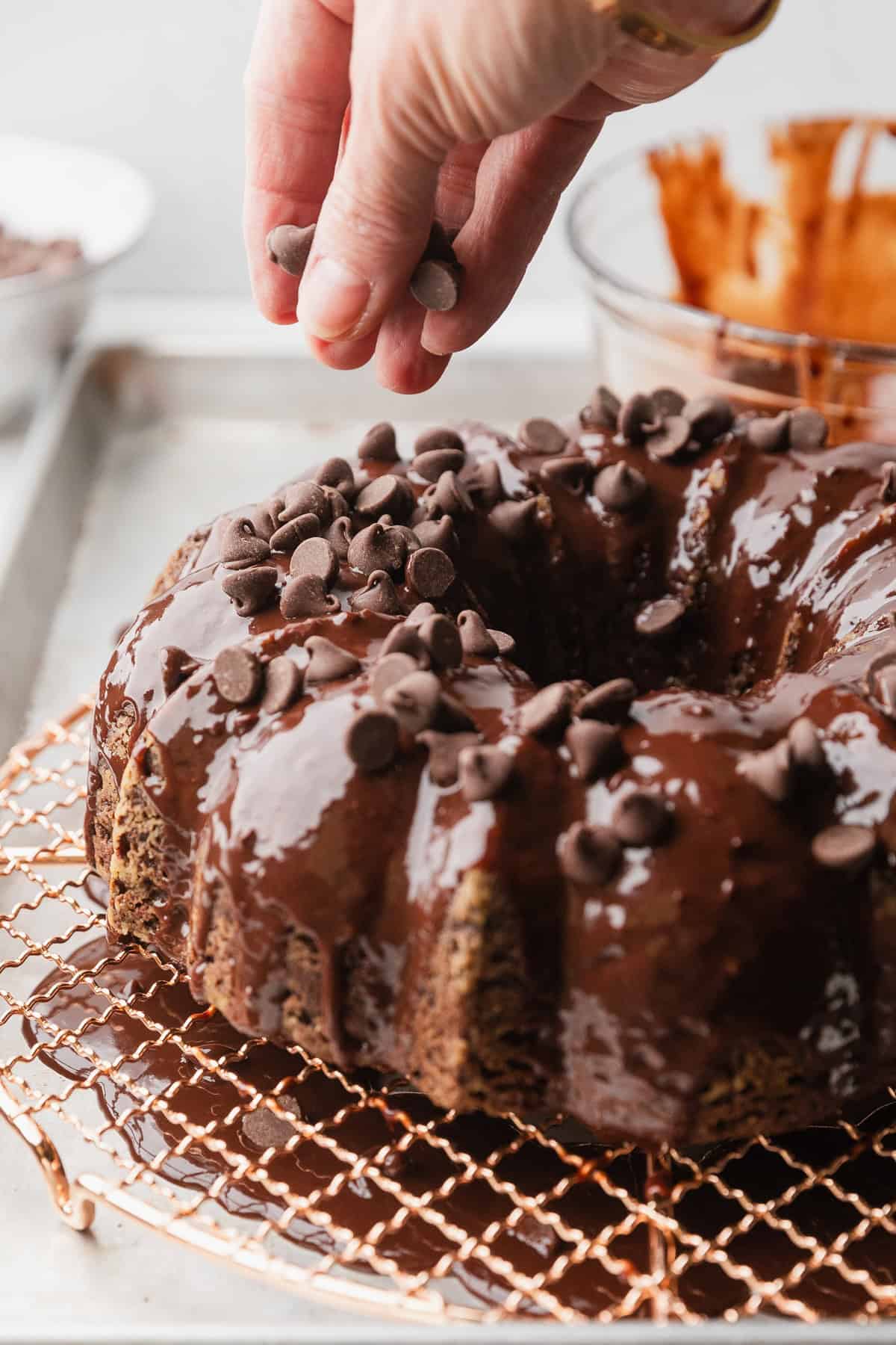 Topping cake with chocolate chips.