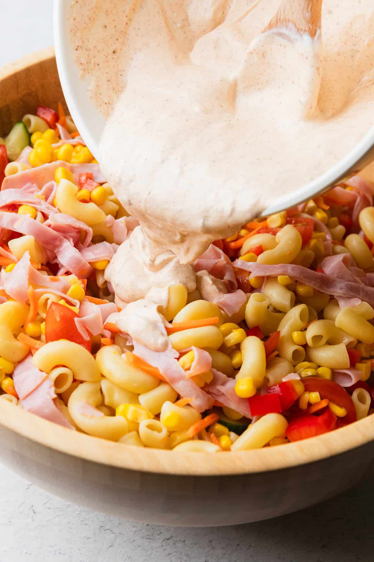 Pour chili lime dressing over the salad.
