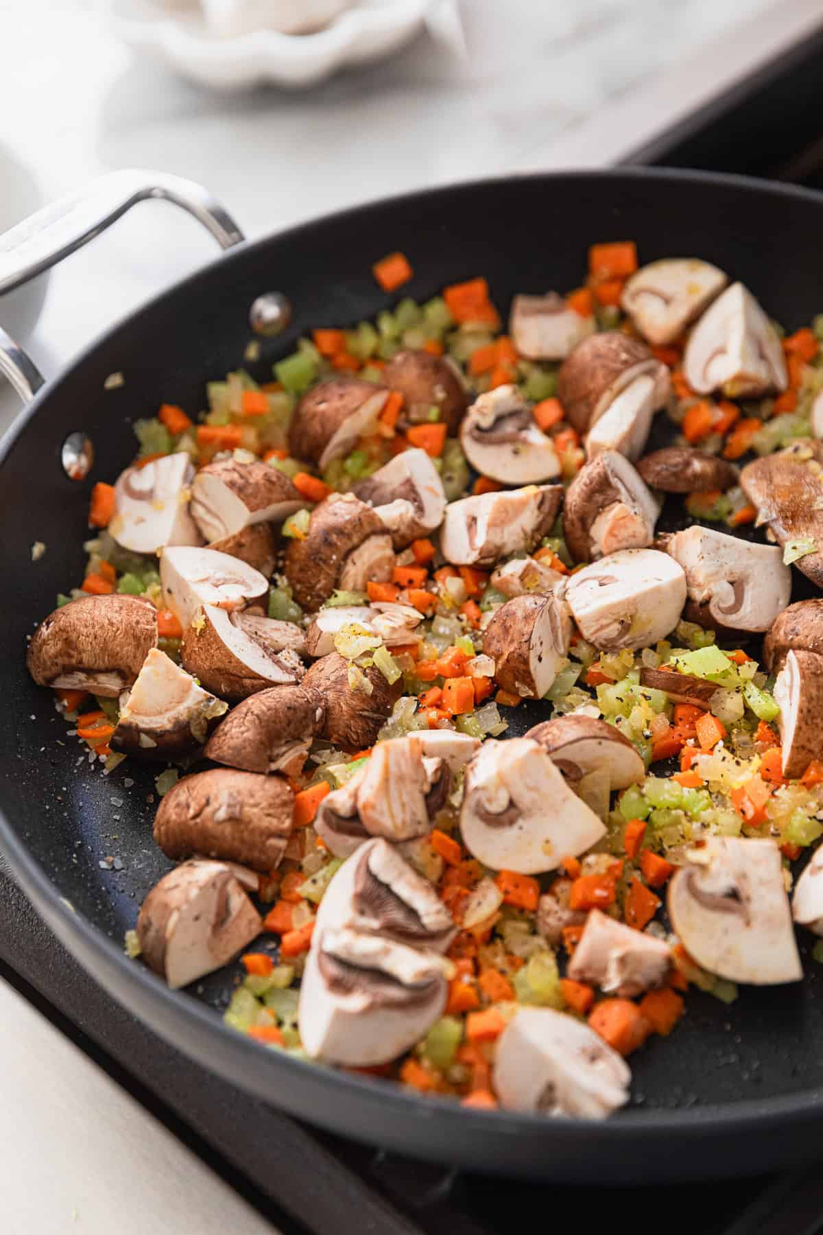 Cooking vegetables in a skillet.