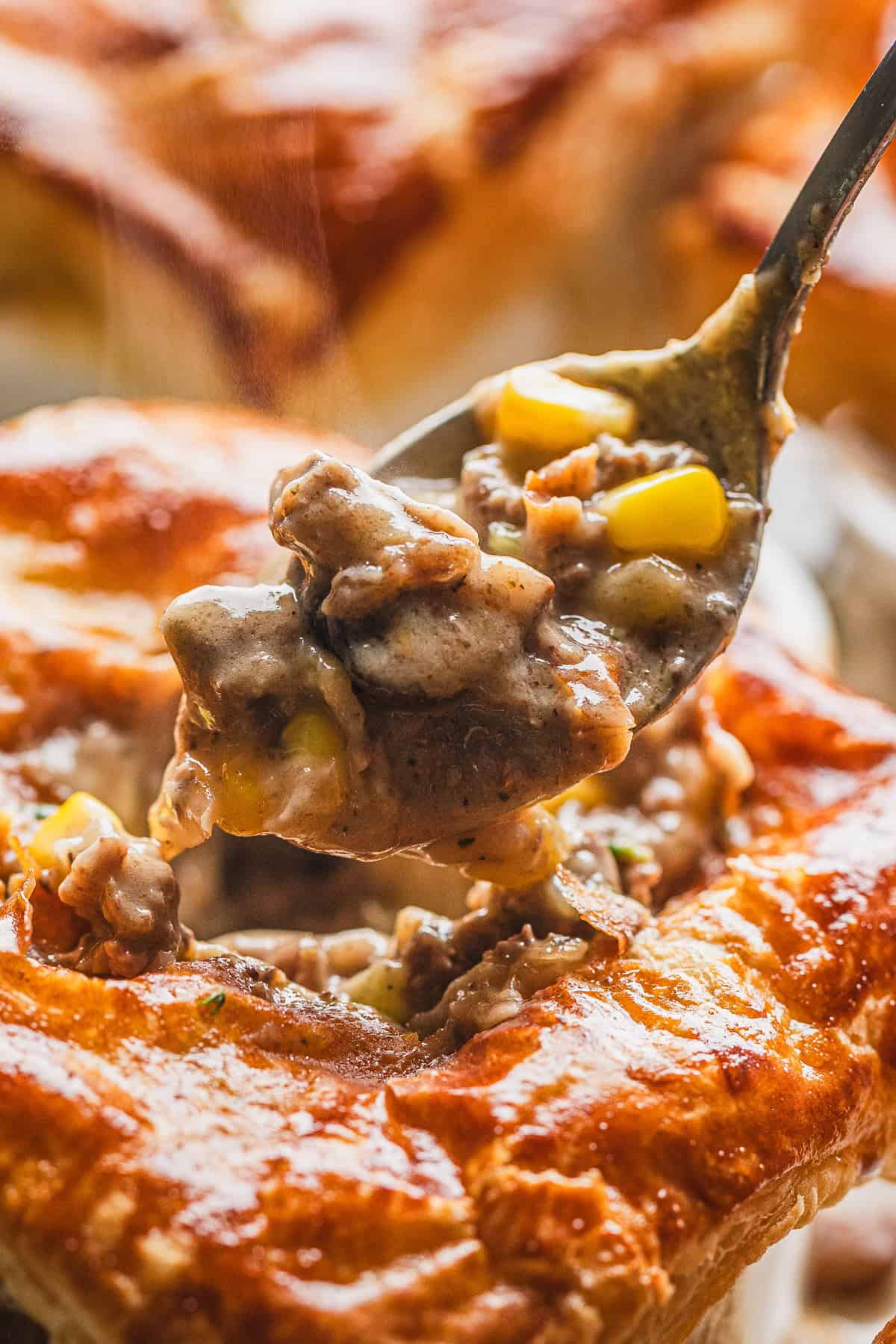 A ground beef pot pie with a puff pastry topping.