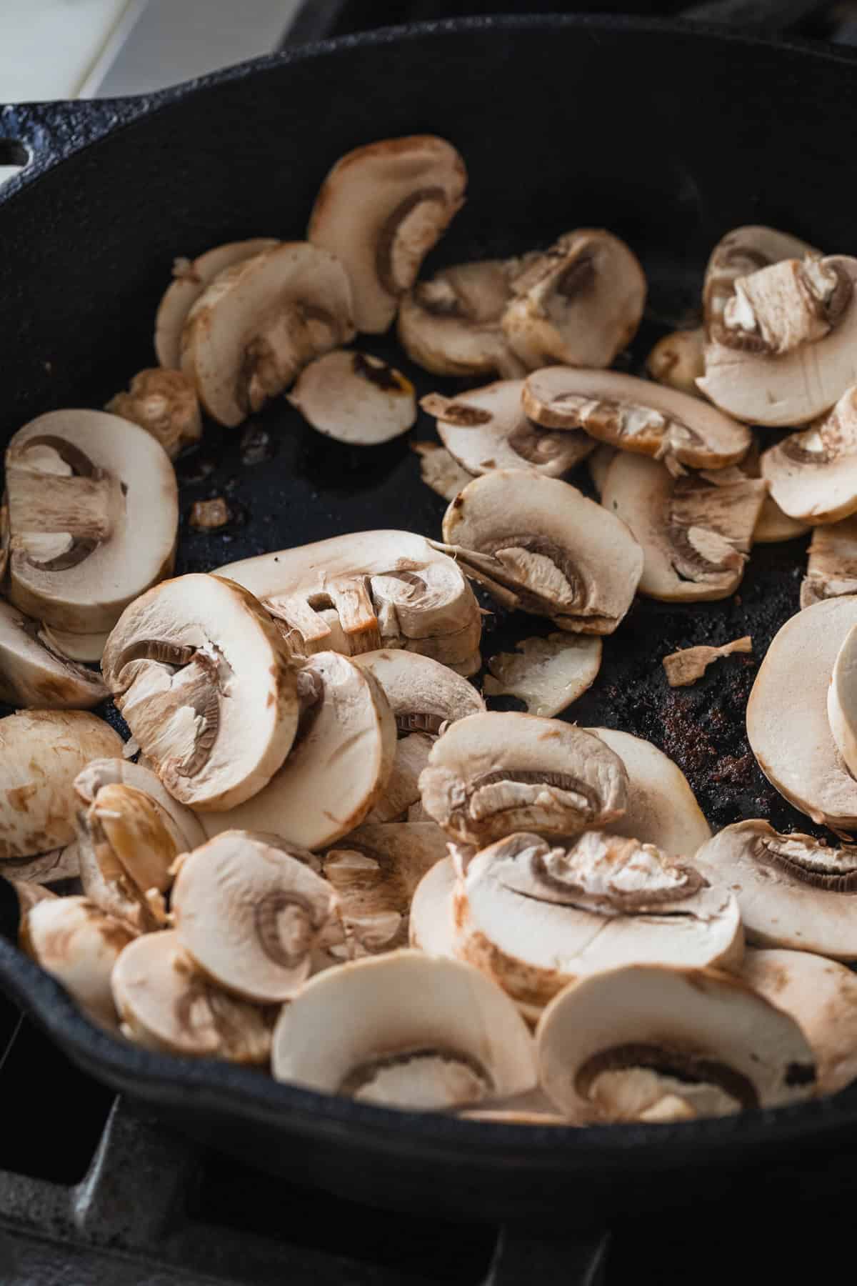 Making a mushroom pan sauce.