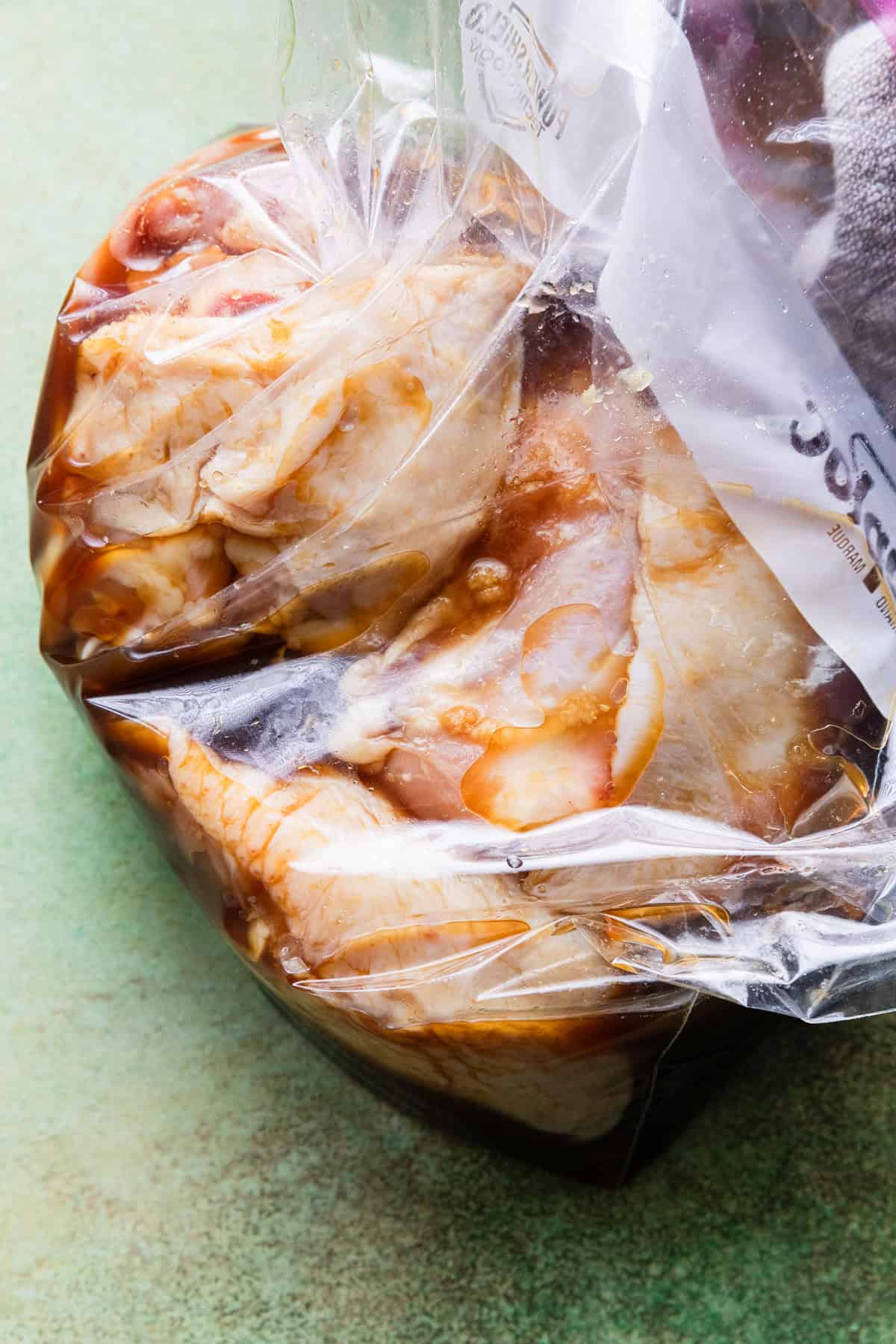 Marinate chicken thighs.