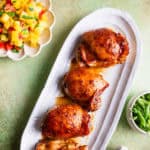 Baked Hawaiian chicken on a platter.