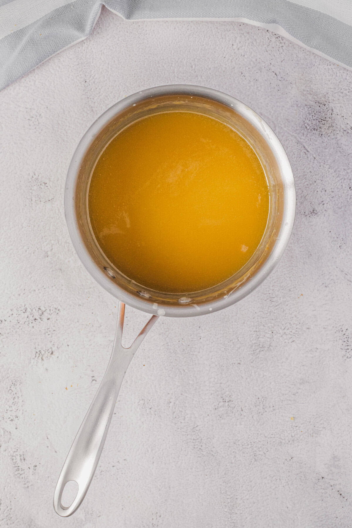 Making butter rum sauce.