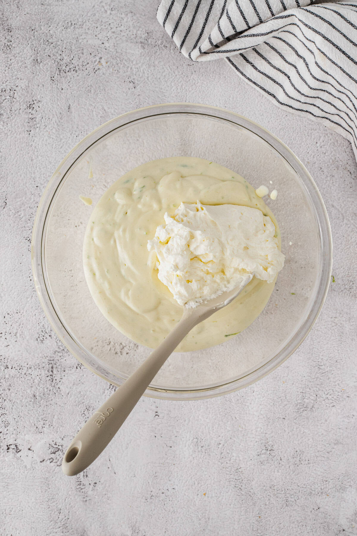 Making whipped cream to top the pies.