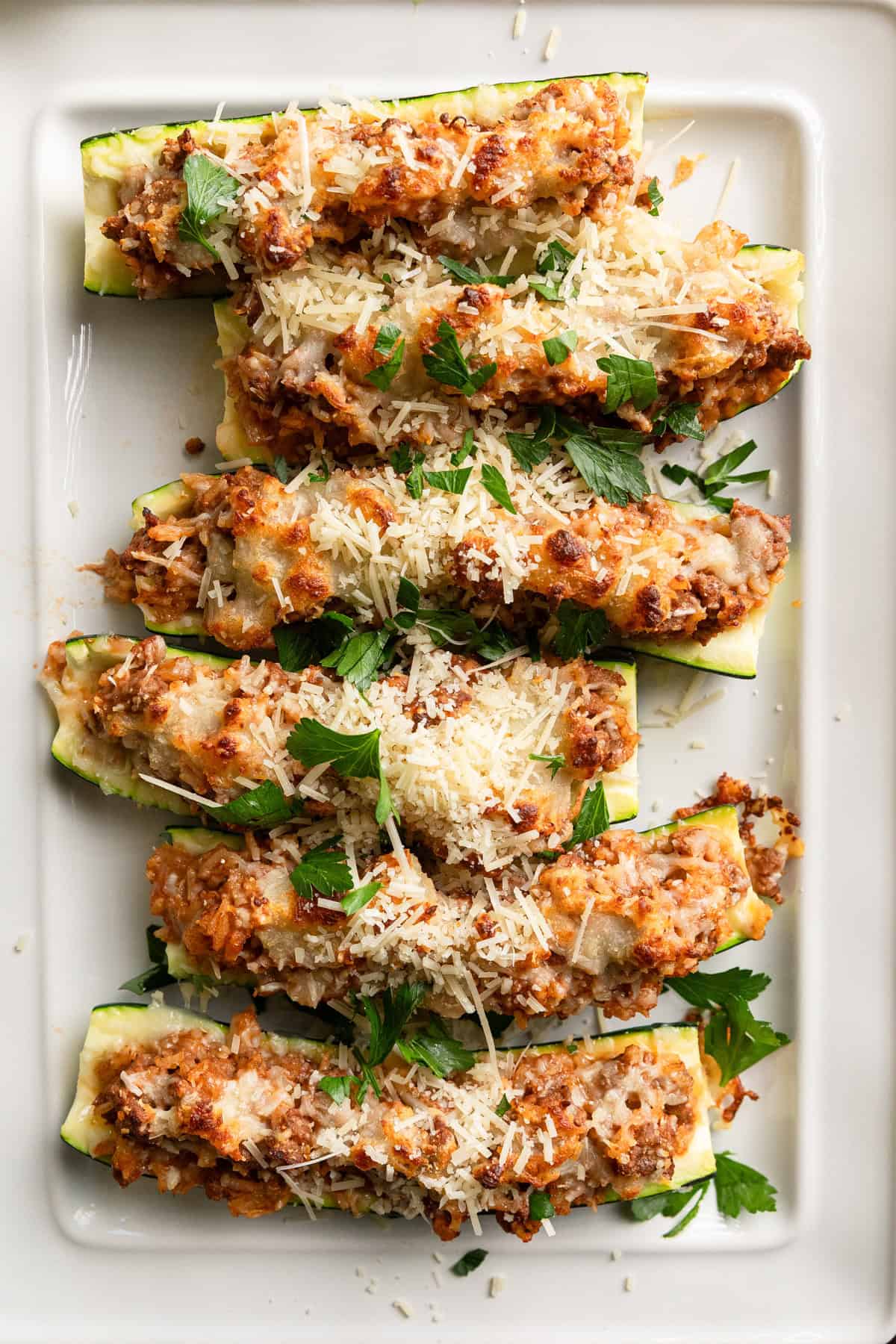 The complete stuffed zucchini recipe on a platter.