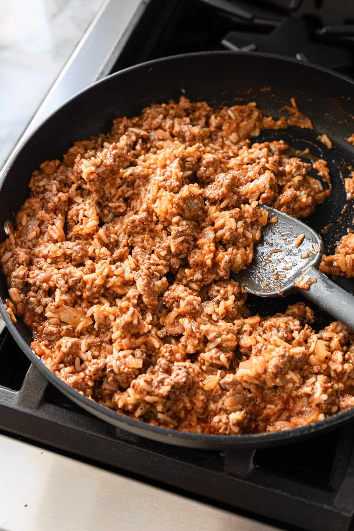 The final stuffing mixture in a skillet.