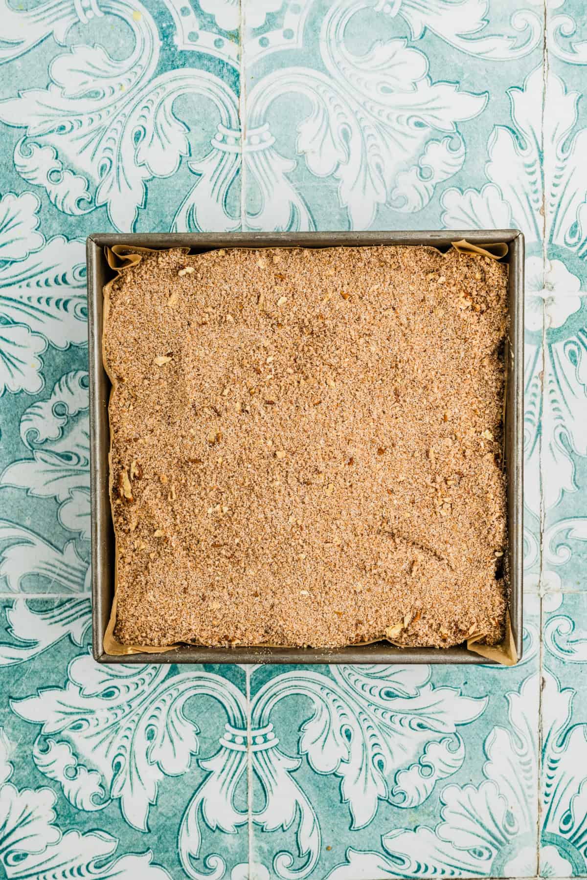 The streusel topping on top of the batter.