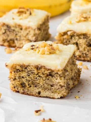 Browned butter banana bread cut into squares.