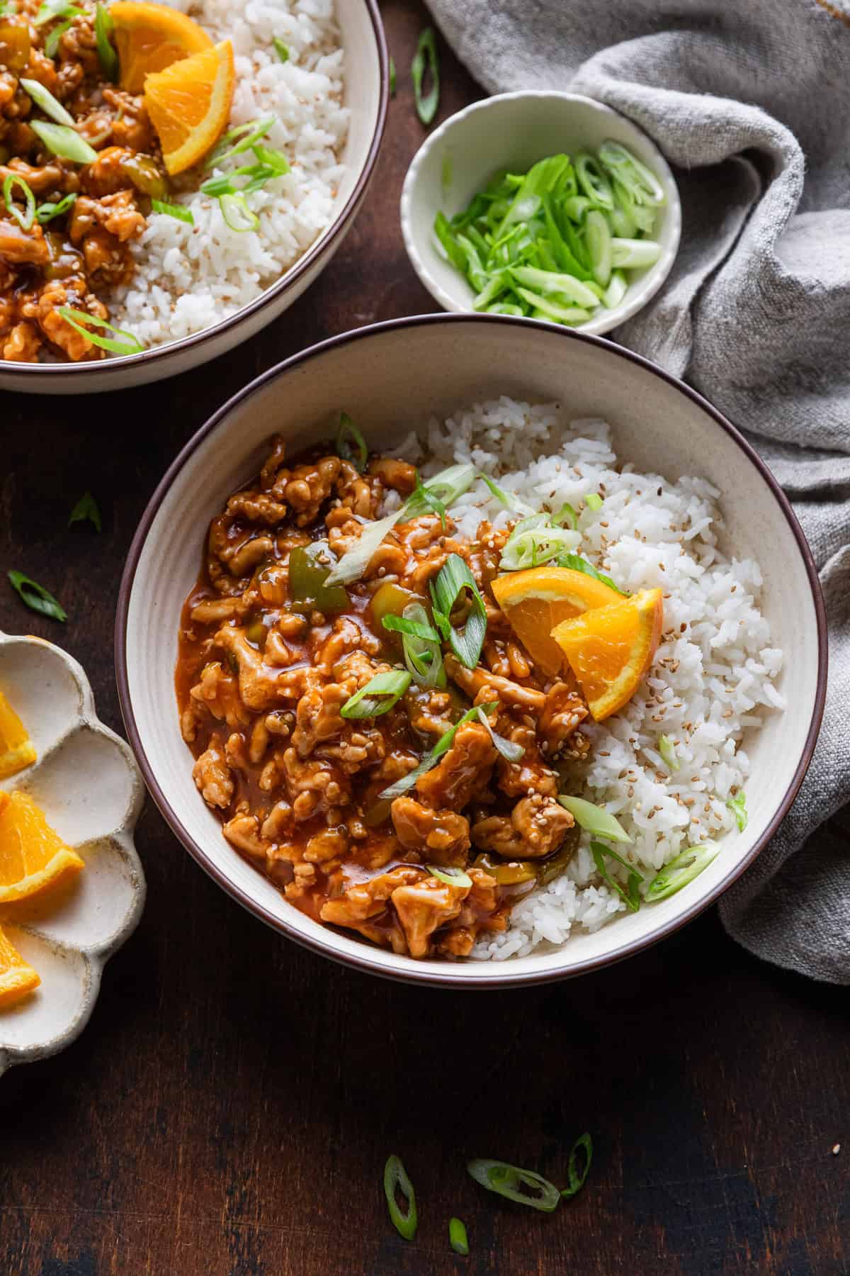 Ground chicken in orange sauce with rice.