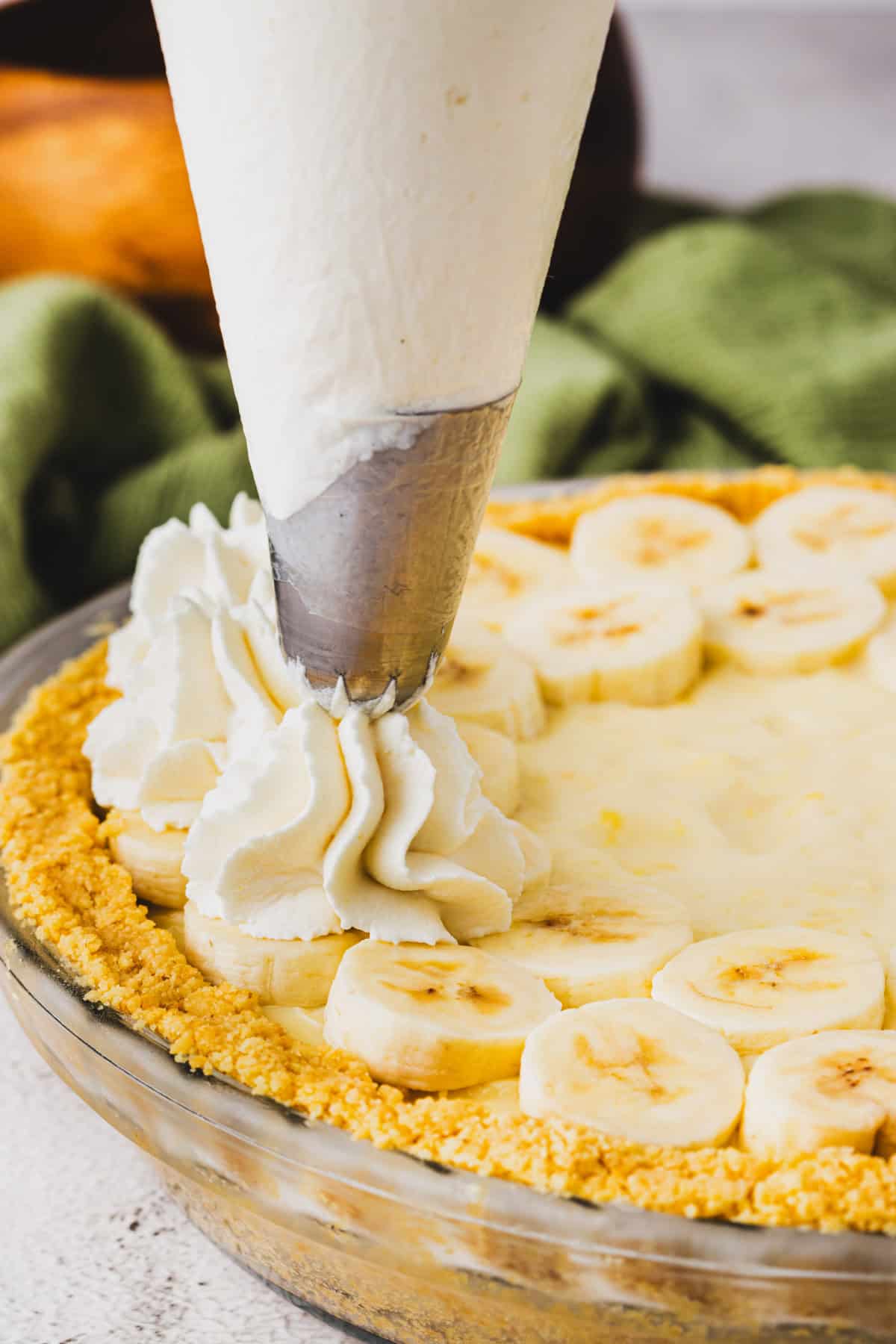 Pipe whipped cream around edges of pie.