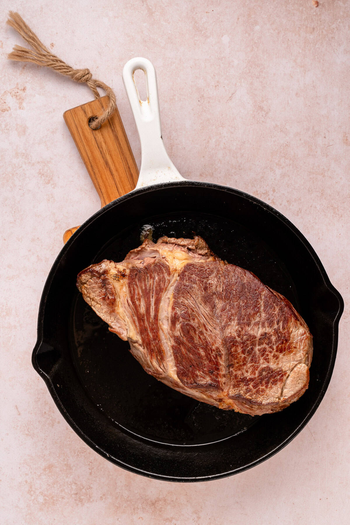 Searing a chuck roast.