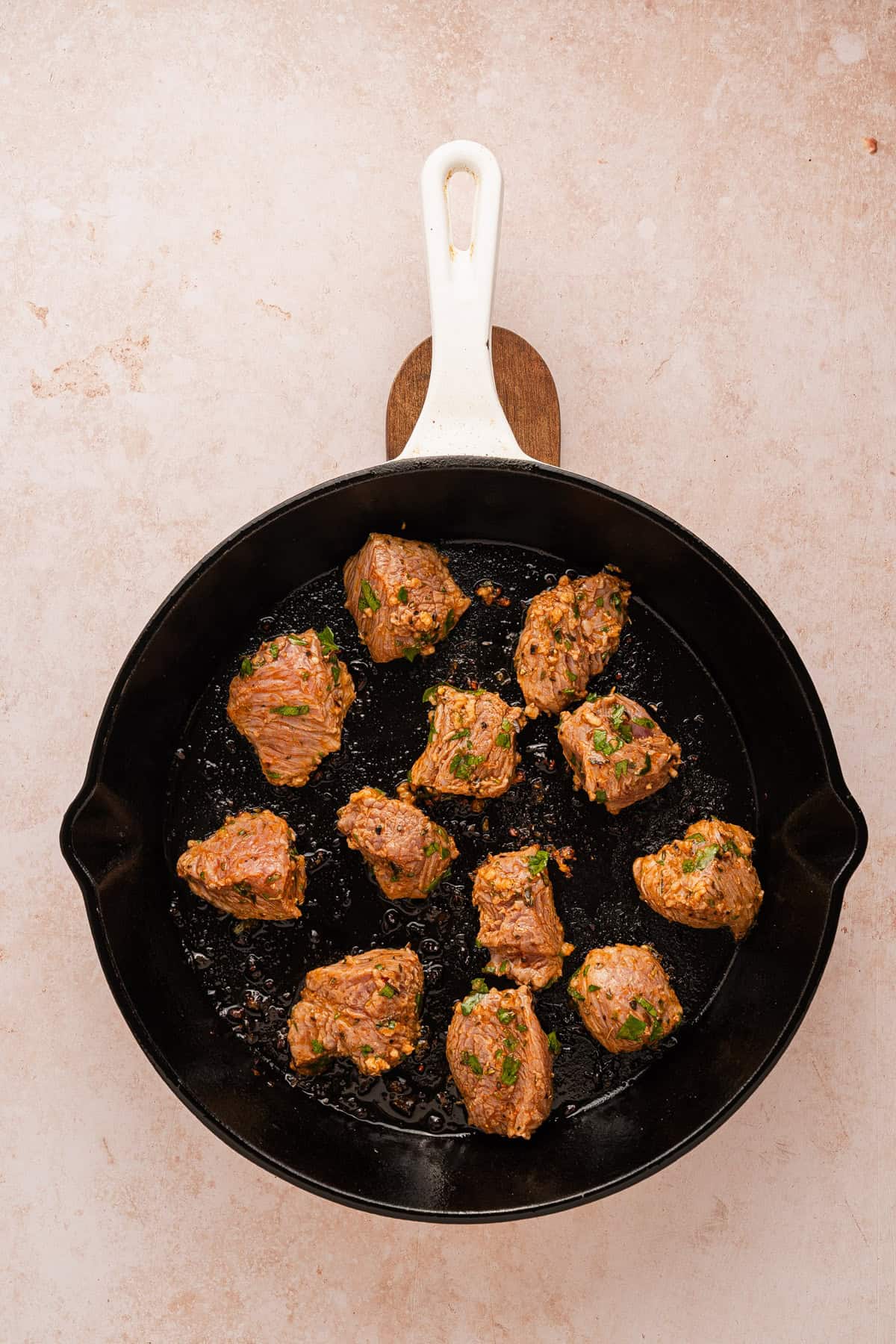 A skillet of steak bites.