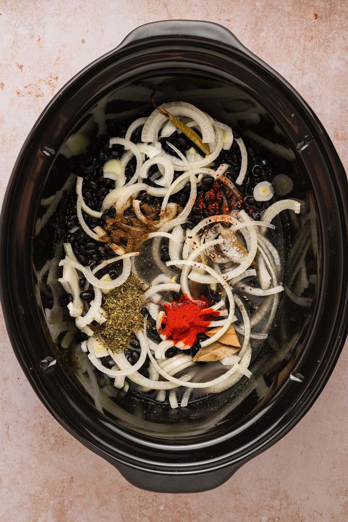 Adding ingredients to the crockpot.