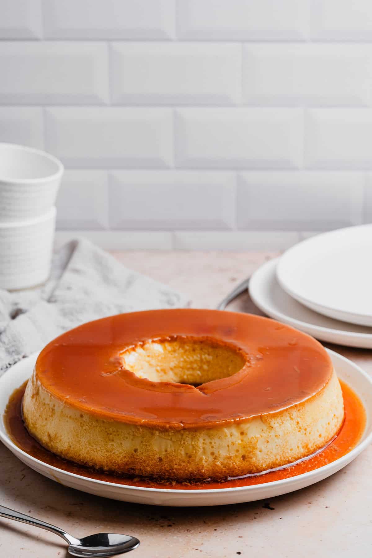 A completed Brazilian flan on a kitchen counter.