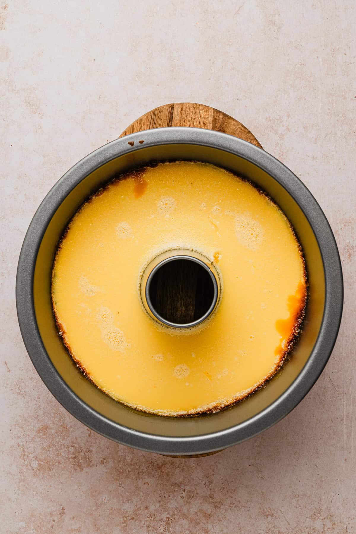 The flan set in tube pan right after baking.