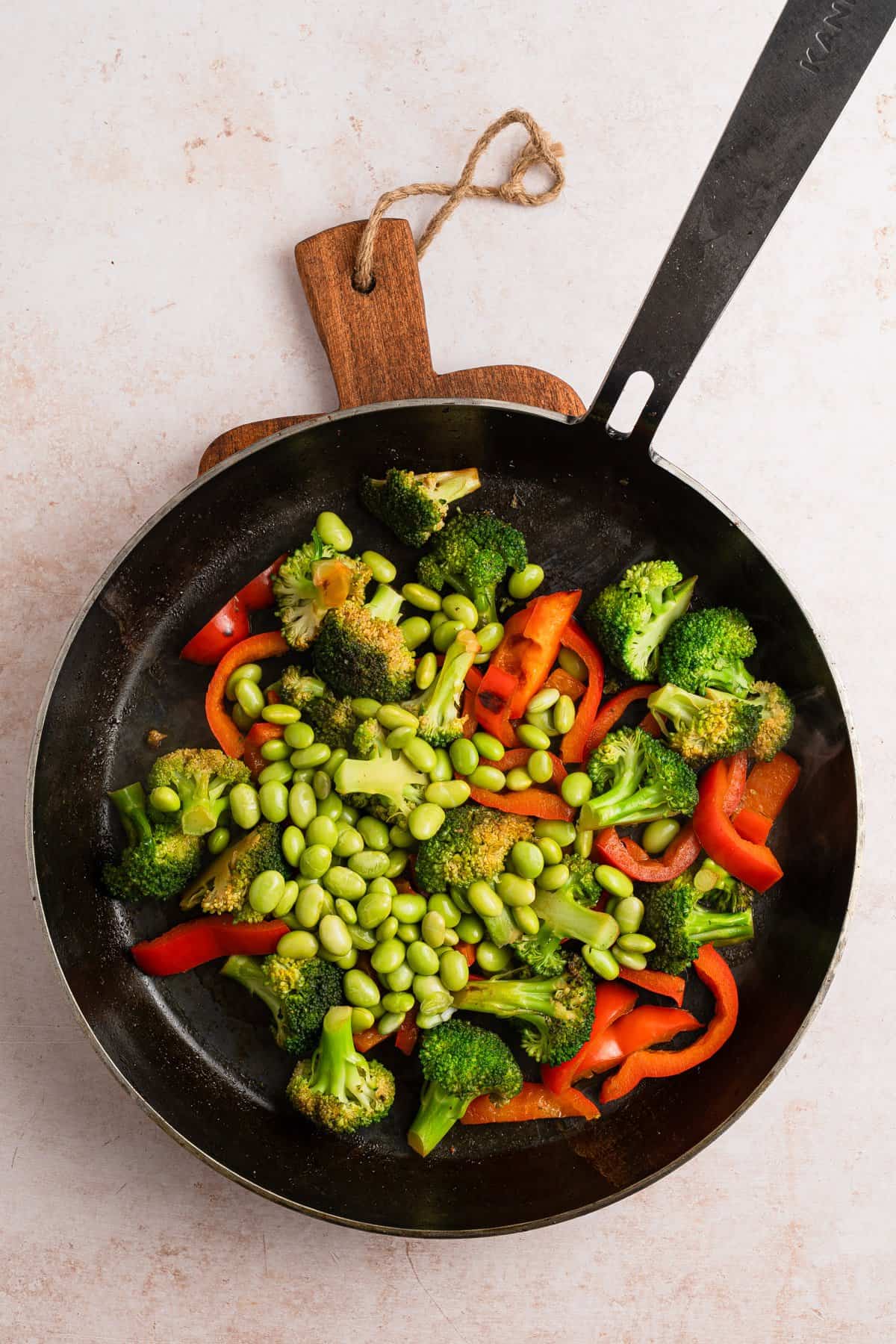 Vegetables cooking in the skillet.
