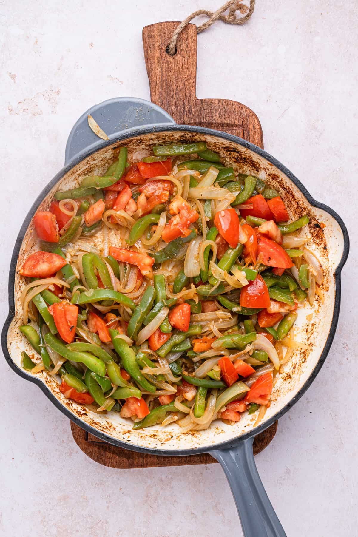 Vegetables cooked in skillet.