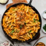 A pan with cooked cajun salmon pasta completed.