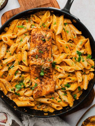 A pan with cooked cajun salmon pasta completed.