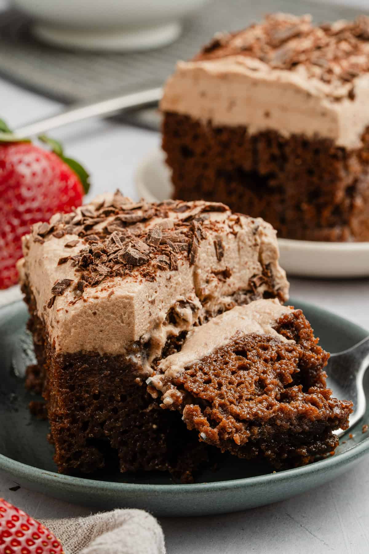 Completed cake with a bite taken out.