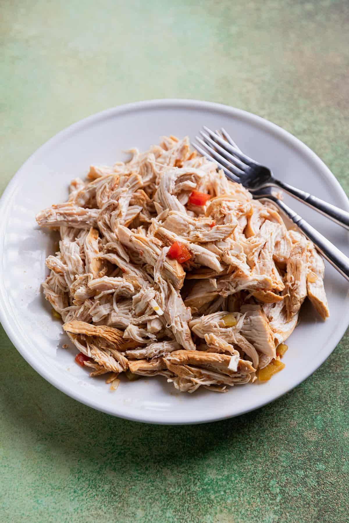 Shredded chicken on a plate.