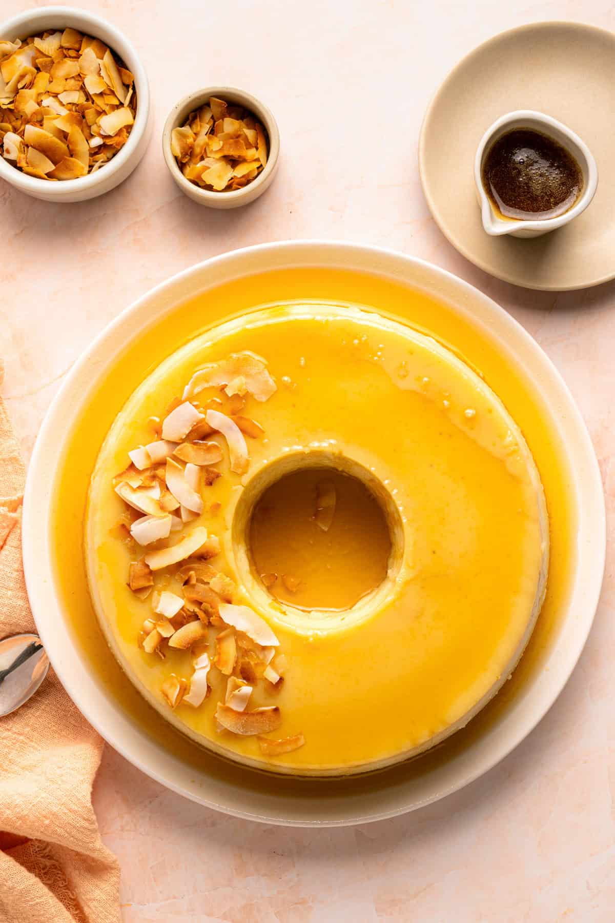 Coconut flan dessert on a plate.