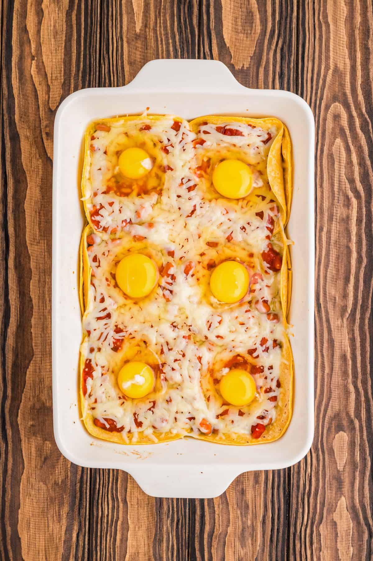 Raw eggs added to casserole.