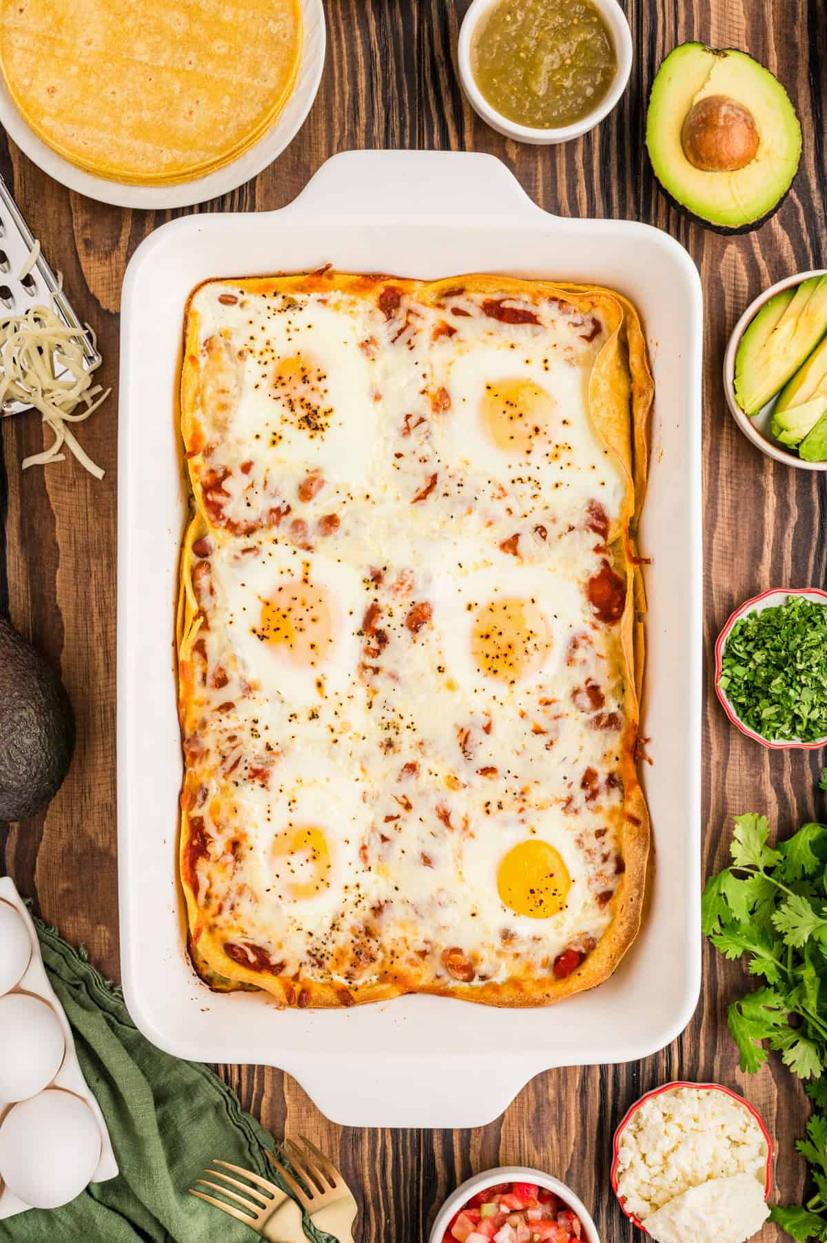 Huevos rancheros casserole baked with eggs cooked.