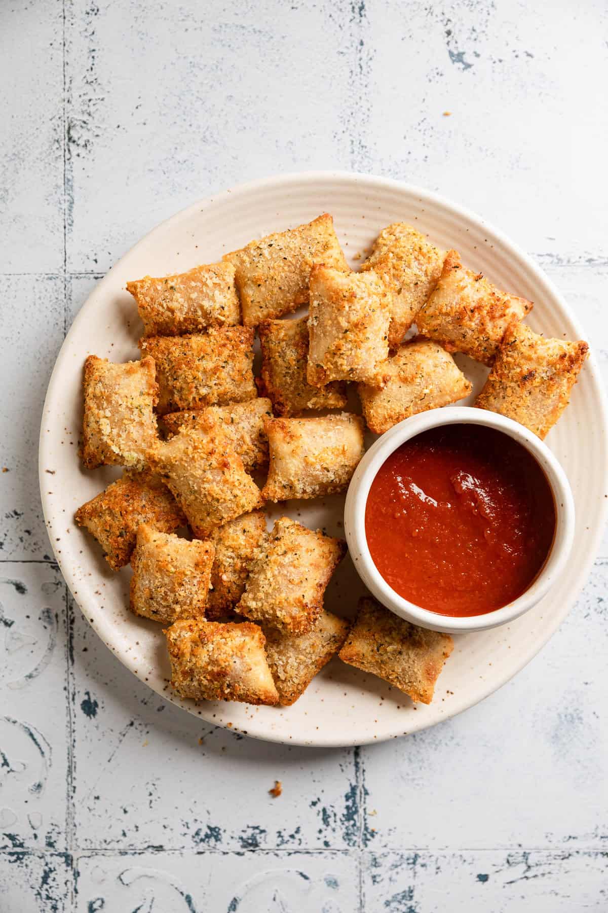 Completed pizza rolls on a plate.