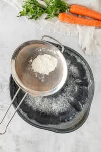 Grease and flour a bundt pan.