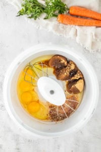 Adding ingredients to a bowl.