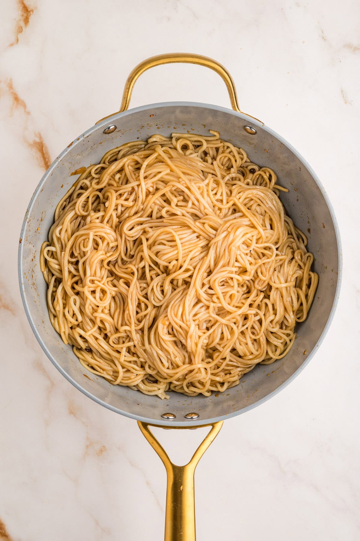 Mixed sauce and lo mein.