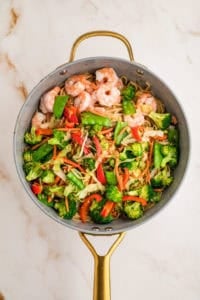 All stir fry ingredients together in a skillet.