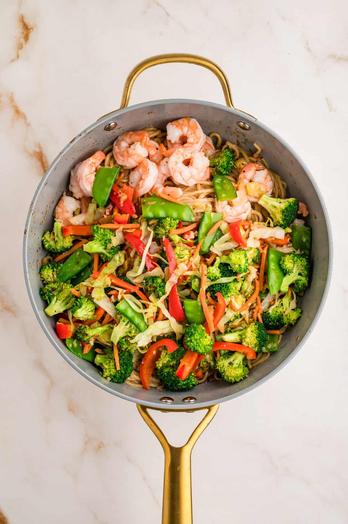 All stir fry ingredients together in a skillet.