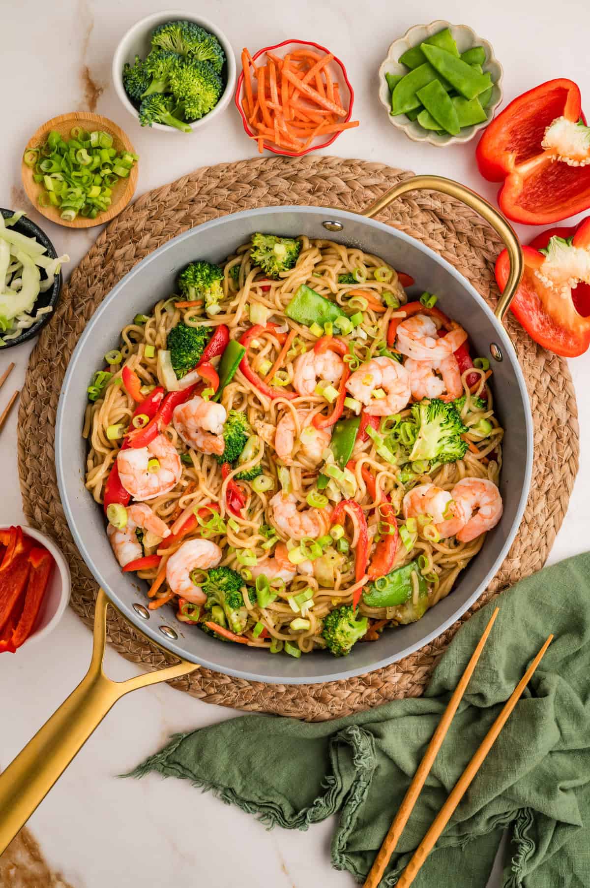 The completed shrimp stir fry on a table.