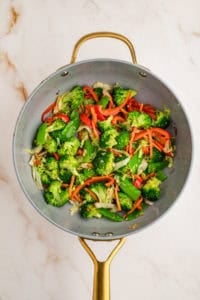 Stir fried vegetables in skillet.