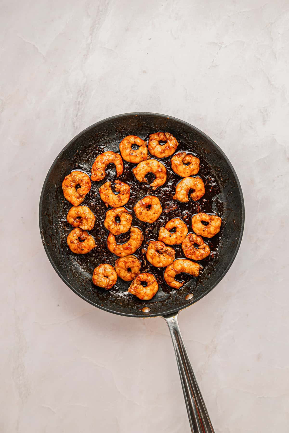 Cooked shrimp in sweet and spicy sauce.