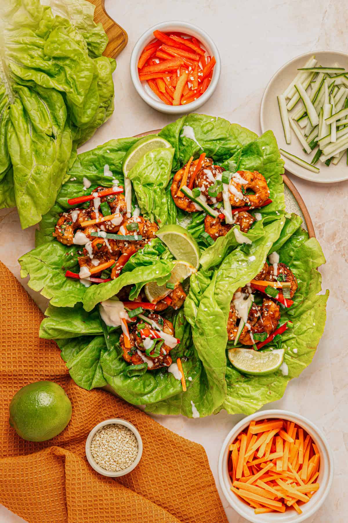Lettuce filled with cooked shrimp and garnished.